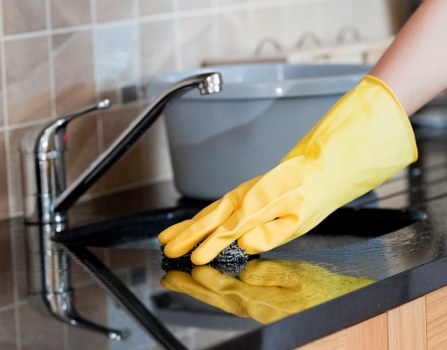 Professional carpet cleaning team working safely in a residential property