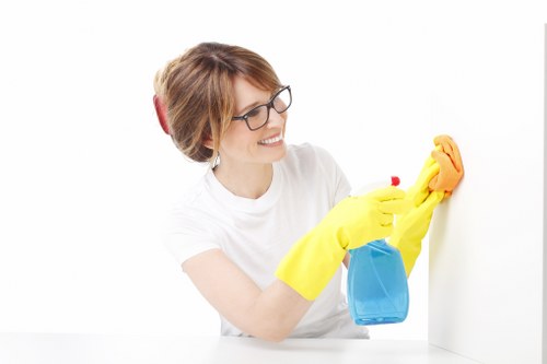 Carpet cleaning team applying safety procedures during a cleaning job