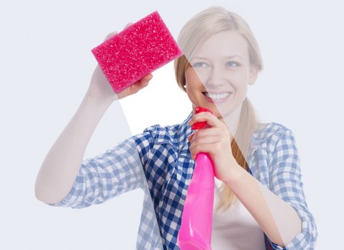 Technician carrying out safe carpet cleaning with clear work area